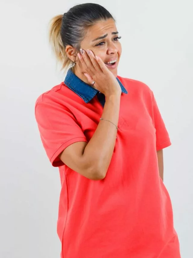 Lady suffering from fungal ear infection. Web stories image