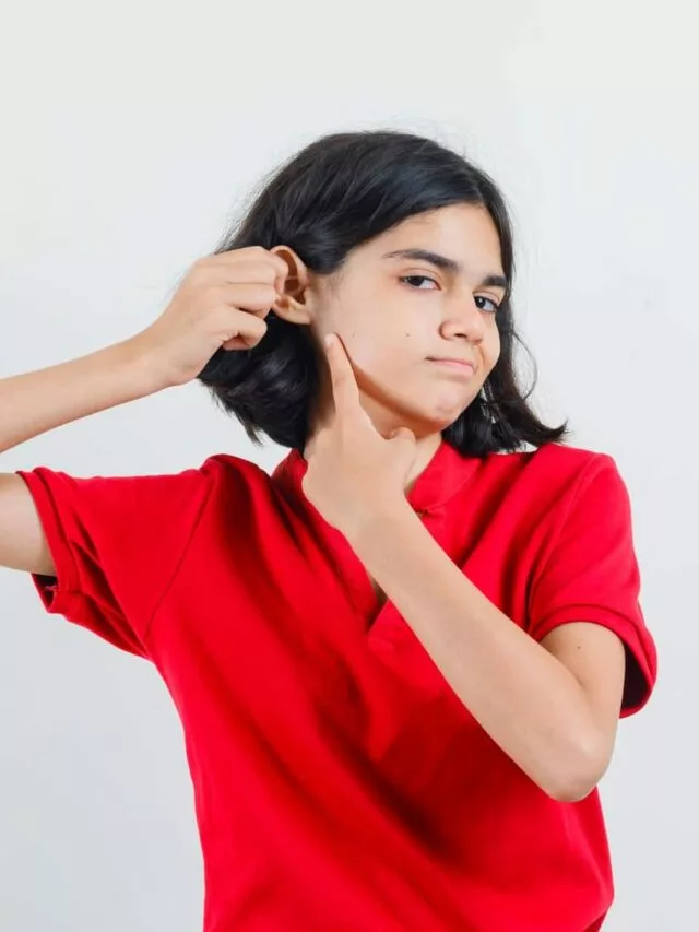 Girl showing itchy ears Web stories image